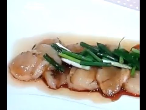 ホタテにごま油をかけた料理