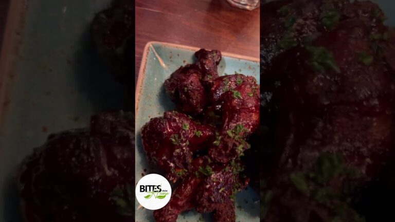“Ultimate BBQ Feast: Eating the Best Chicken Wings Drenched in Barbecue Sauce!”