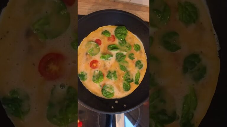 Cheesy Veggie Omelette  🧀 🍳 Quick, fluffy & loaded with 🍄‍🟫 spinach🌱 & cherry tomatoes 🍅